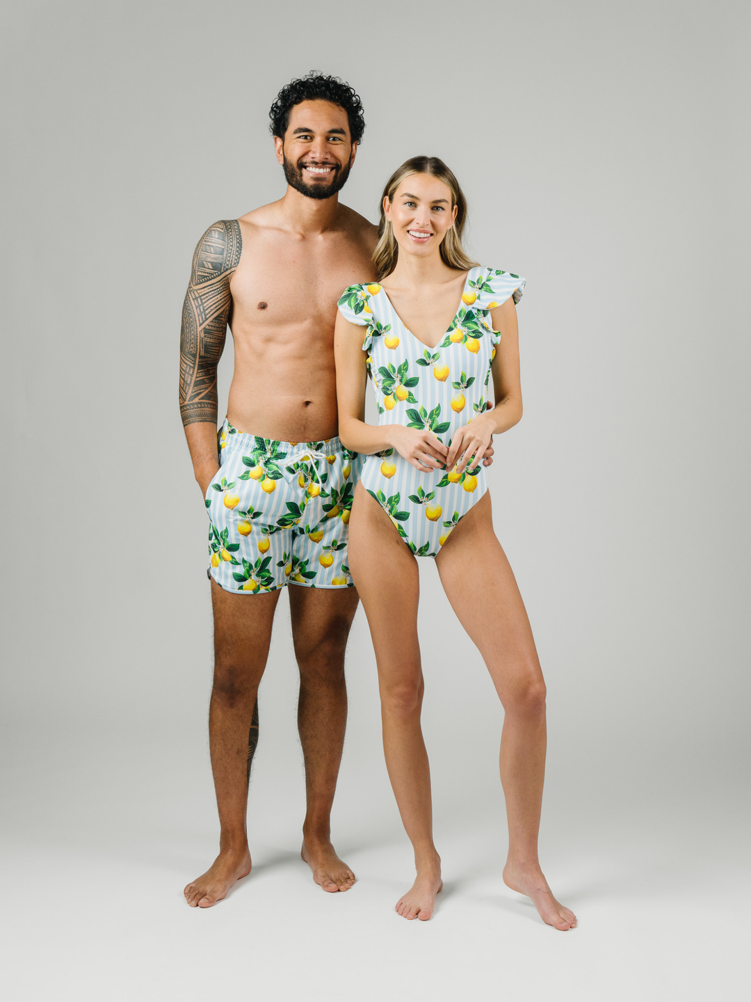 Navalora Swim Men's Amalfi Coast Inspired Lemon Swim Shorts, Couple wearing Matching Swimsuits in Studio