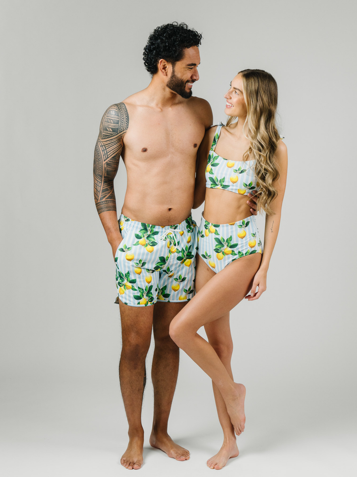 Navalora Swim Men's Amalfi Coast Inspired Lemon Swim Shorts, Couple Wearing Matching Swimsuits in Studio