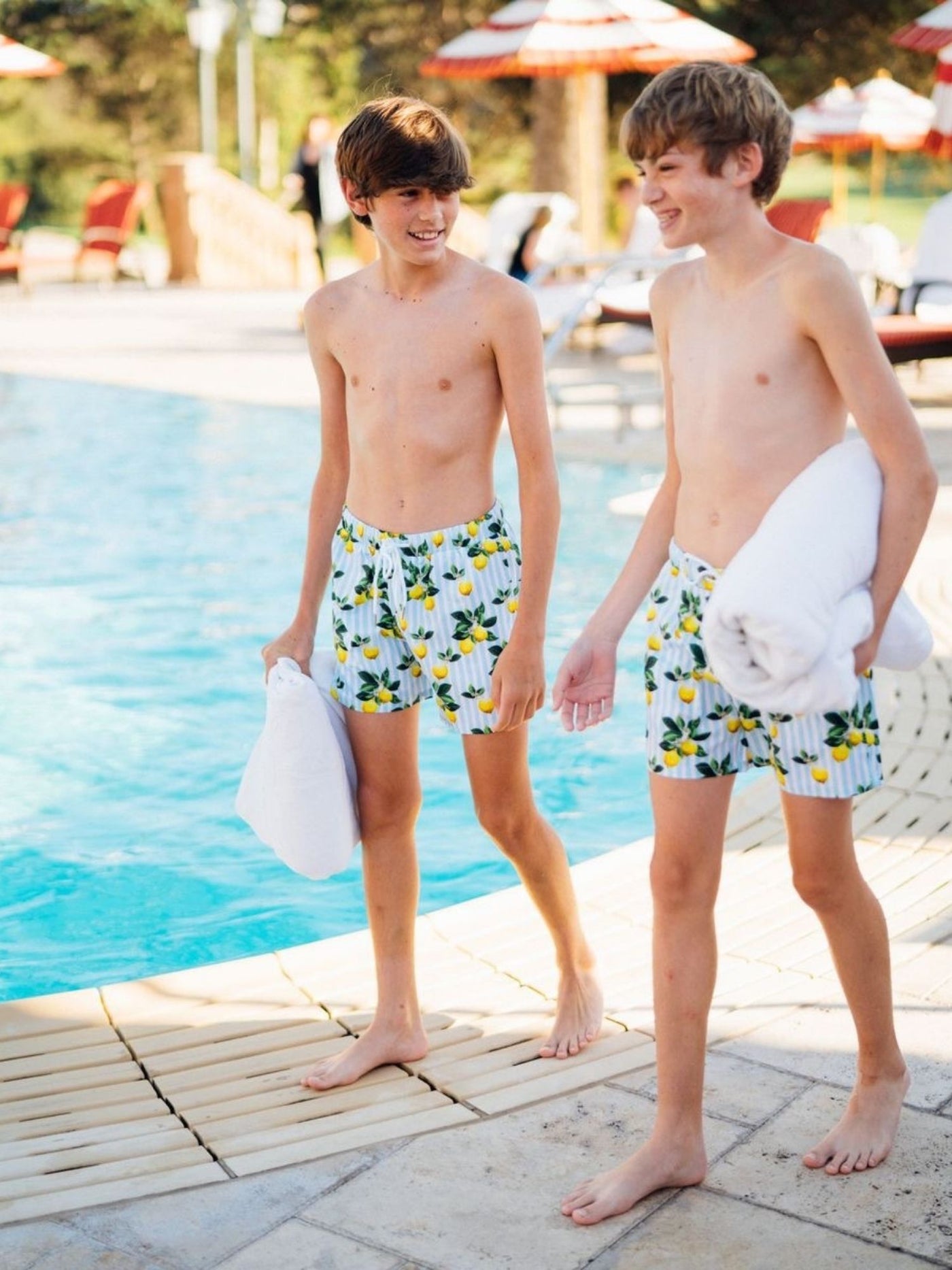 Brothers wearing Navalora Amalfi Coast Lemon Matching Swimsuits 
